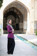 iranian lady in Fin gardens in Kashan, Iran