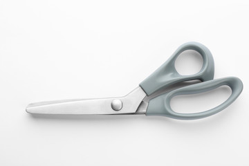 Fototapeta premium New pair of sewing scissors on white background