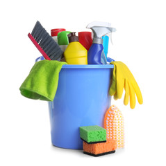 Bucket with cleaning supplies isolated on white
