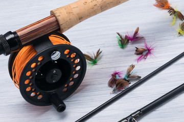 fishing gear lie on a gray background close-up