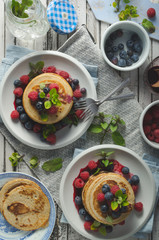 Pancakes with forest fruit sauce