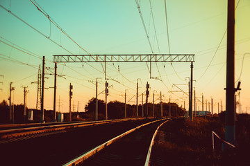 Fototapeta na wymiar Railway at sunset Russian railway. Rails at sunset