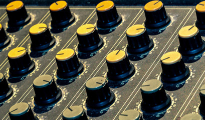 Audio sound mixer console. Sound mixing desk. Music mixer control panel in recording studio. Audio...