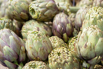 Fototapeta na wymiar Artichokes. Vegetables market in Italy. Agricultural food. Fresh organic products.