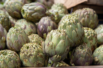 Artichokes. Vegetables market in Italy. Agricultural food. Fresh organic products.