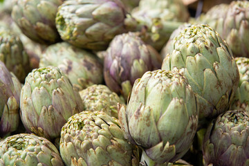 Artichokes. Vegetables market in Italy. Agricultural food. Fresh organic products.