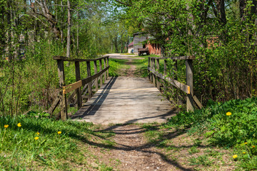 wooden plank foothpath boardwalk trampoline in the lake