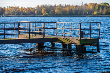wooden plank foothpath boardwalk trampoline in the lake