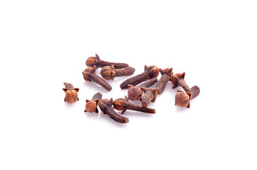 dry cloves on white background