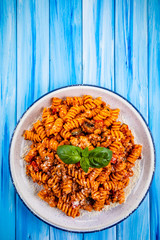 Pasta with meat, tomato sauce and vegetables