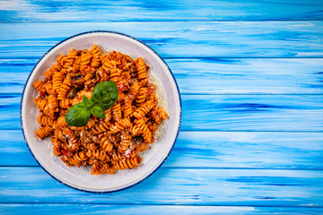 Pasta with meat, tomato sauce and vegetables