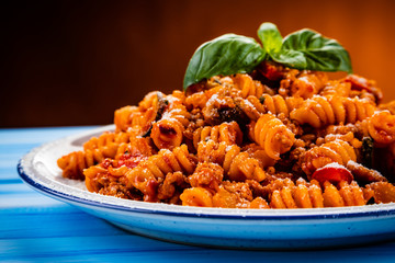 Pasta with meat, tomato sauce and vegetables