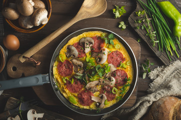 Homemade delish egg omelette with salami