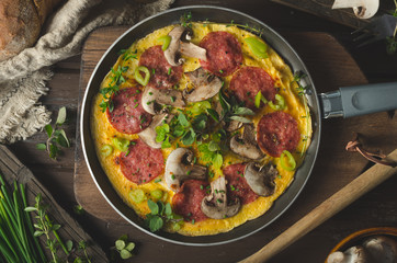 Homemade delish egg omelette with salami