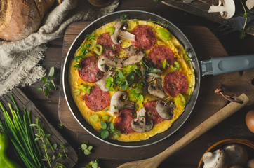 Homemade delish egg omelette with salami