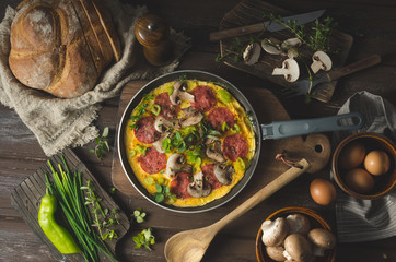 Homemade delish egg omelette with salami