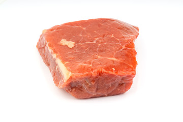 Fototapeta premium Fresh raw beef meat slices isolated over white background. Selective focus