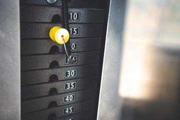 Weight scale of  Weightlifting plate of the training machine in the fitness center