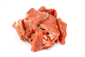 Fresh raw beef meat slices isolated over white background. Selective focus