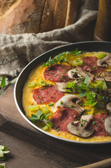 Homemade delish egg omelette with salami