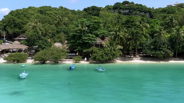 Flight along the beautiful beachfront of Chalok Baan Kao Bay on the paradisiacal island of Koh tao, Thailand