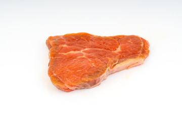 Fresh raw beef meat slices isolated over white background. Selective focus