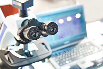 Modern stereo microscope with laptop