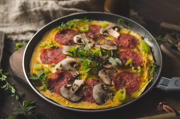 Homemade delish egg omelette with salami