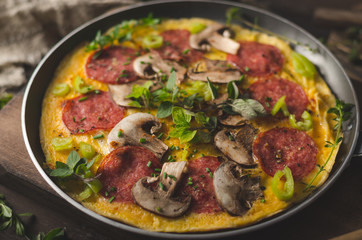 Homemade delish egg omelette with salami