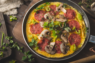 Homemade delish egg omelette with salami