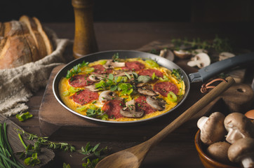 Homemade delish egg omelette with salami