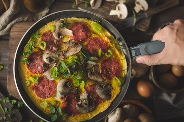 Homemade delish egg omelette with salami