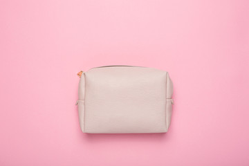 Women's beauty handbag for cosmetics on a pink background