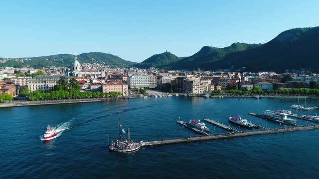 Lake of Como. City of Como and monument of Life Electric. Tourists destination in Italy. Aerial view