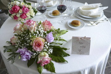 wedding bouquet on a restaurant table
