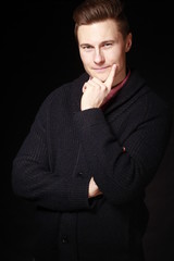 Young Handsome White Male Fashion Model with Brown Hair Isolated on Black Background