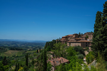 Fototapeta na wymiar In the very heart of Tuscany. View from the fortress wall to the beautiful valley of the medieval town of Montepulciano, Italy.