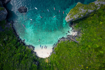 aerial view phi phi island high season thai and foreign tourists are snorkelling by renting a long tail boat and speed boat for travelling