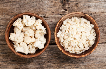 cauliflower over wooden table, vegetarian food 