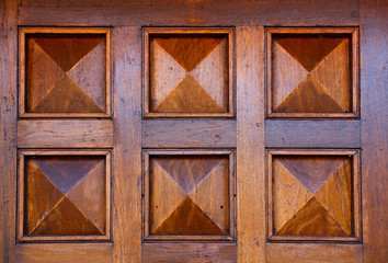Details of a wooden front door.
