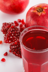 grains of a grenade on a white acrylic background