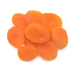 Heap of dried apricots fruit isolated on white background. Top view, flat lay