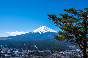 Fototapeta na wymiar Mount Fuji view from Mt. Fuji Panorama Rope way, commonly called Fuji san in Japanese, Mount Fuji's exceptionally symmetrical cone, which is snow capped for about five months a year of Japan.