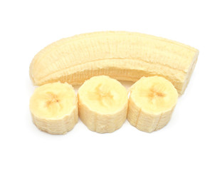 Banana half and slice isolated on white background. Top view, flat lay