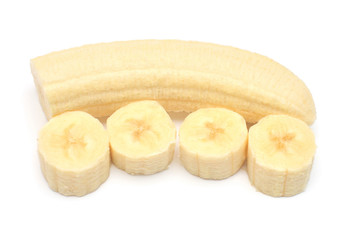 Banana half and slice isolated on white background. Top view, flat lay