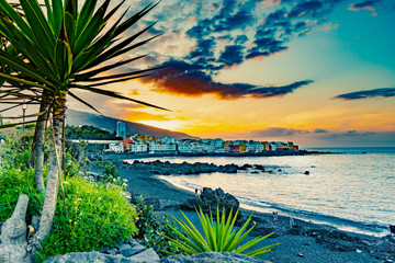 Sunset at the beach Playa Jardín in Puerto De La Cruz in Tenerife, Canary Islands, Spain