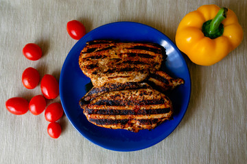 Grilled chicken fillet with vegetables.