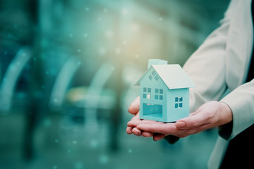 Closeup at home That women are dreaming of having house at  very affordable price Home buying...