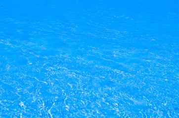 blue surface water in swimming pool