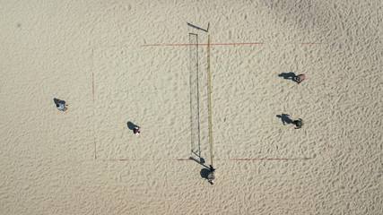 Beach volleyball top view. Sports and beach sports. Photographed from the drone. Aero photo filming